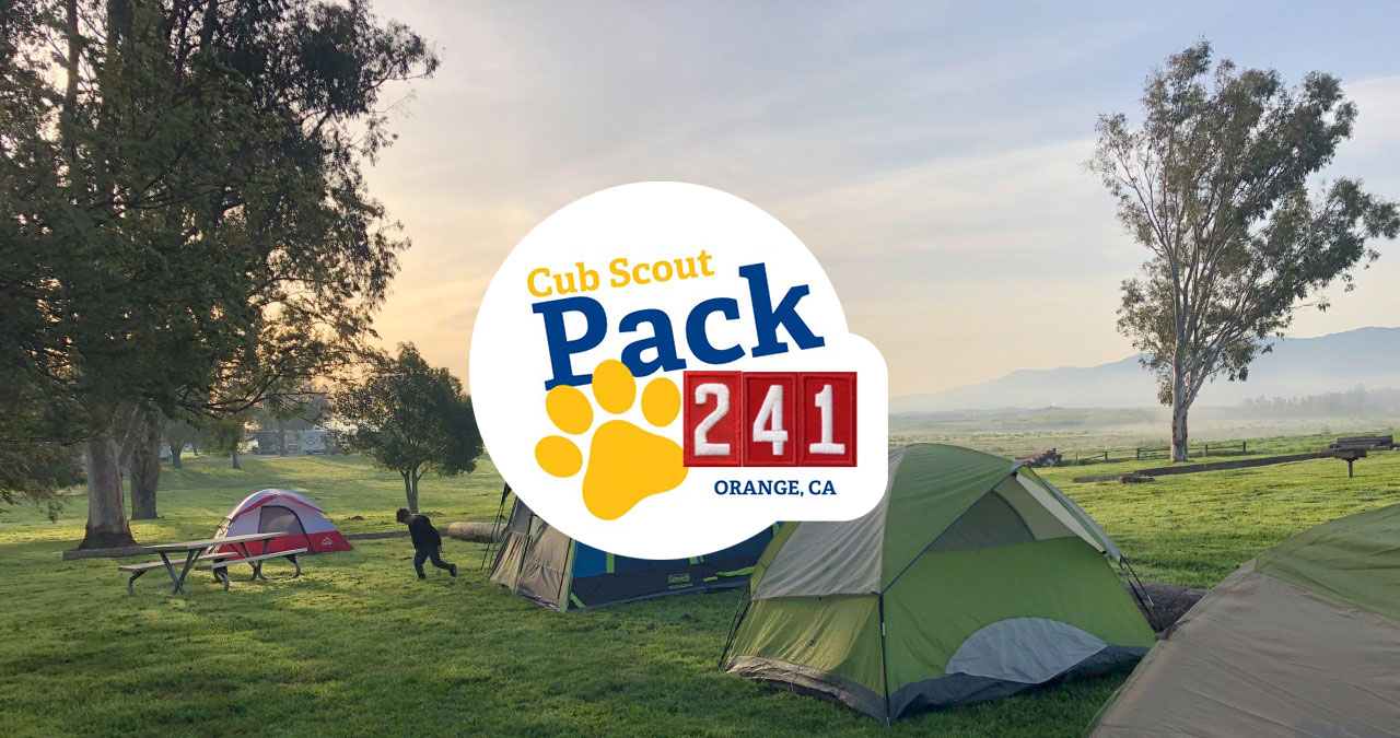 tents on grass with Cub Scout Pack 241 Orange California logo